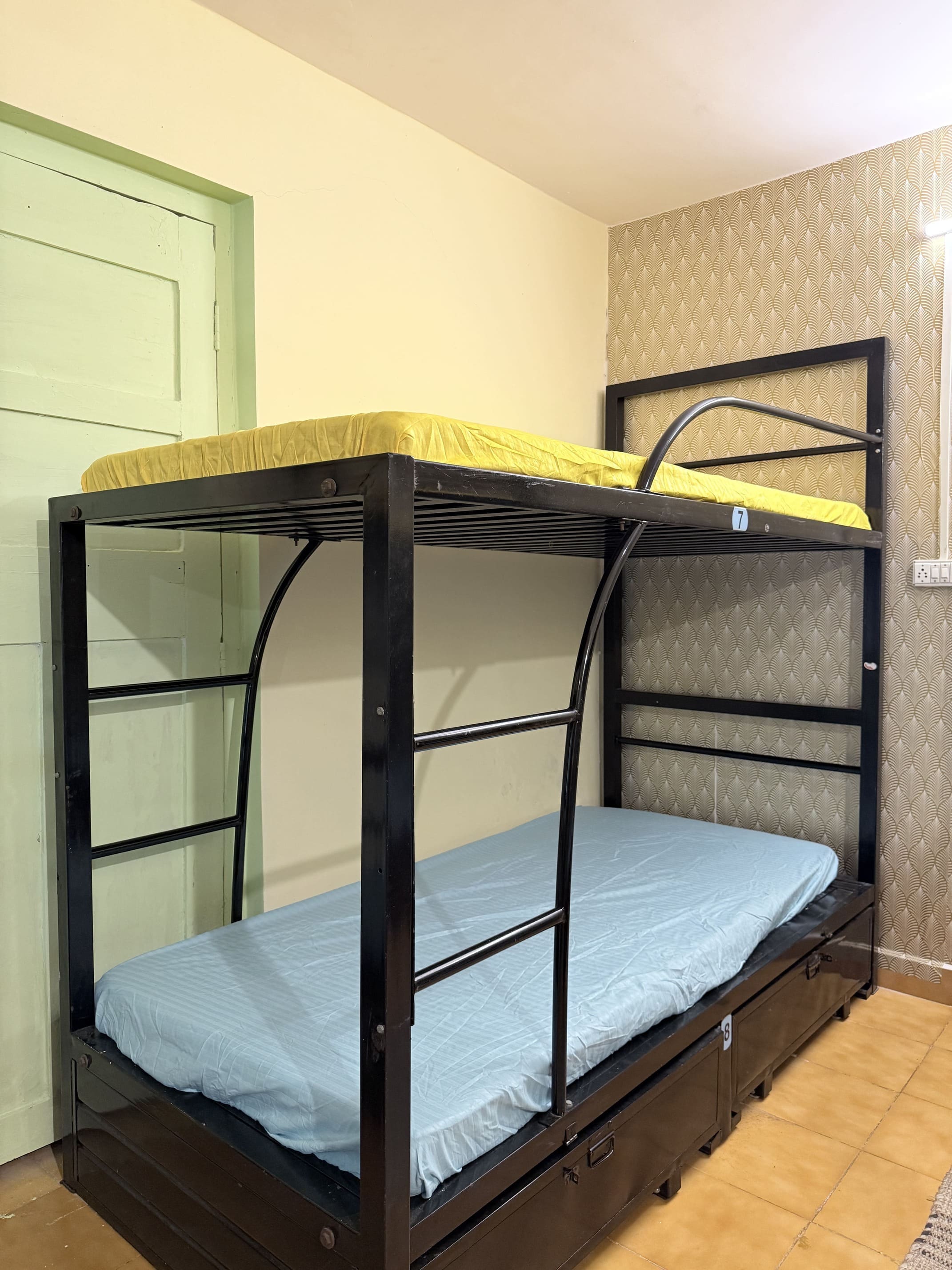 Mixed dormitory room with bunk beds at Endless Blue Hostel in North Goa